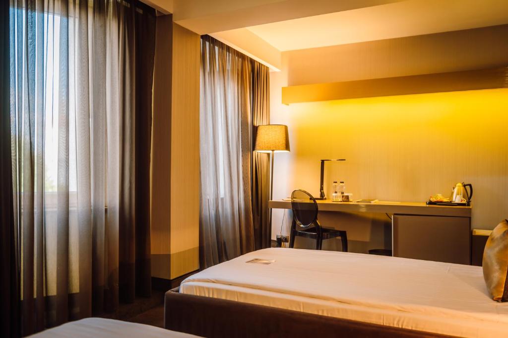Plaza V Executive Hotel - Chambre Jumelle De Luxe