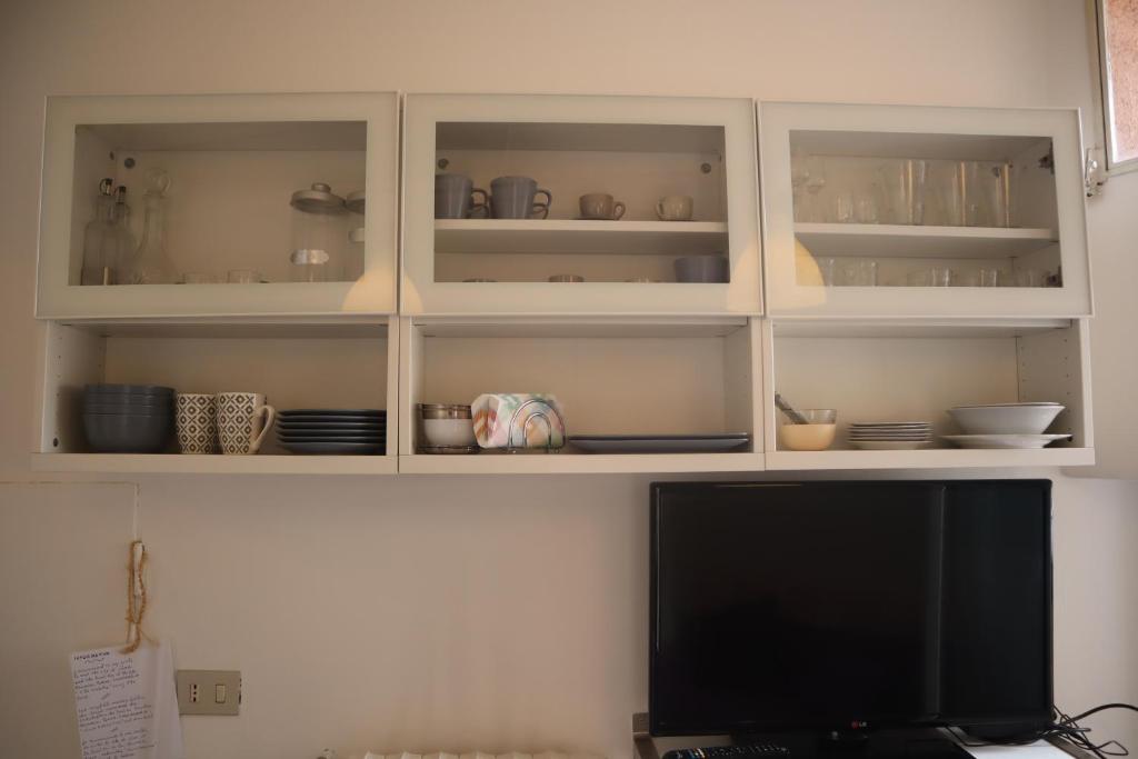 Příslušenství pro přípravu čaje a kávy v ubytování House Al Noce