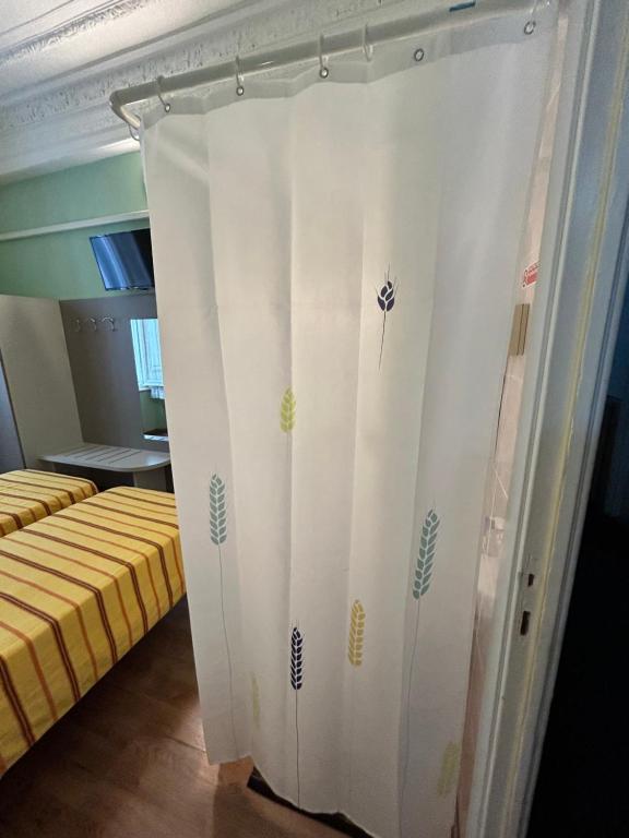 Postel nebo postele na pokoji v ubytování Hotel Barone