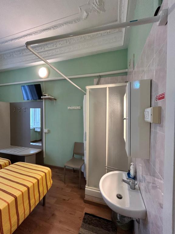 Postel nebo postele na pokoji v ubytování Hotel Barone