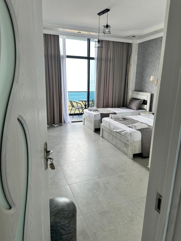 Postel nebo postele na pokoji v ubytování Hotel black sea