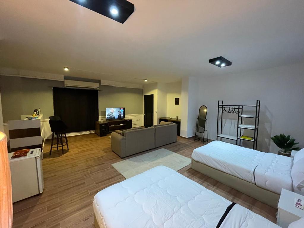 Postel nebo postele na pokoji v ubytování Rove Residence New Cairo