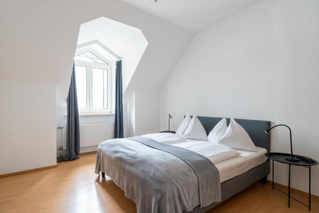 Postel nebo postele na pokoji v ubytování FarawayHomes Studio Fohnsdorf #9