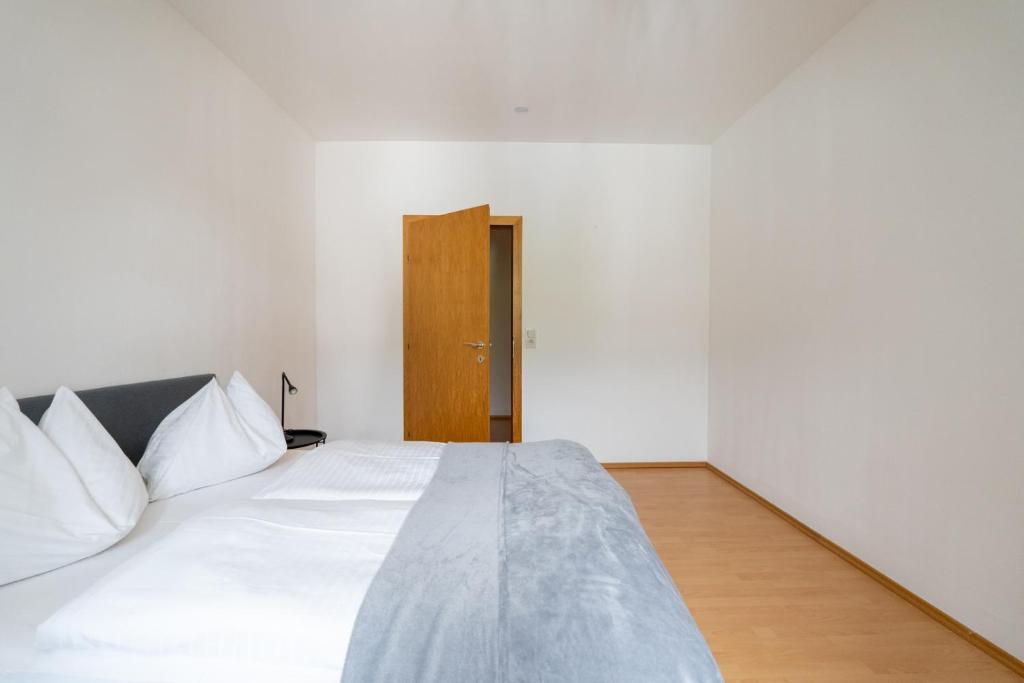 Postel nebo postele na pokoji v ubytování FarawayHomes Studio Fohnsdorf #9