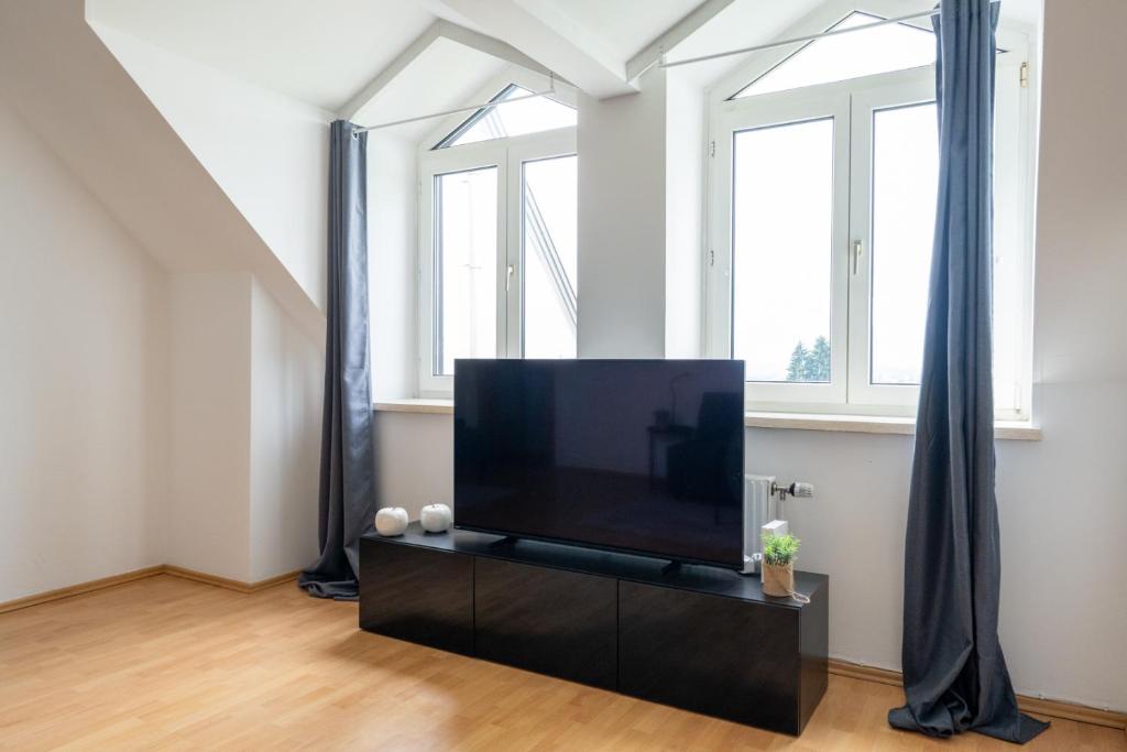 TV a/nebo společenská místnost v ubytování FarawayHomes Studio Fohnsdorf #9