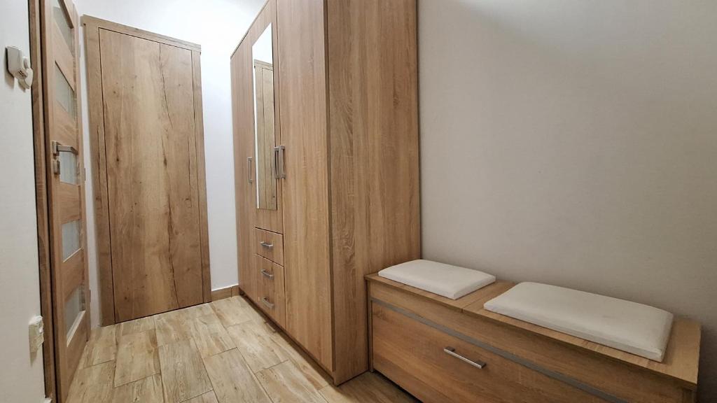 Voodi või voodid majutusasutuse Domek pod jabloní toas