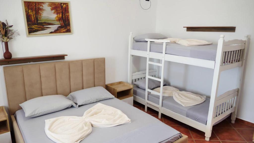 Postel nebo postele na pokoji v ubytování Hotel Laura