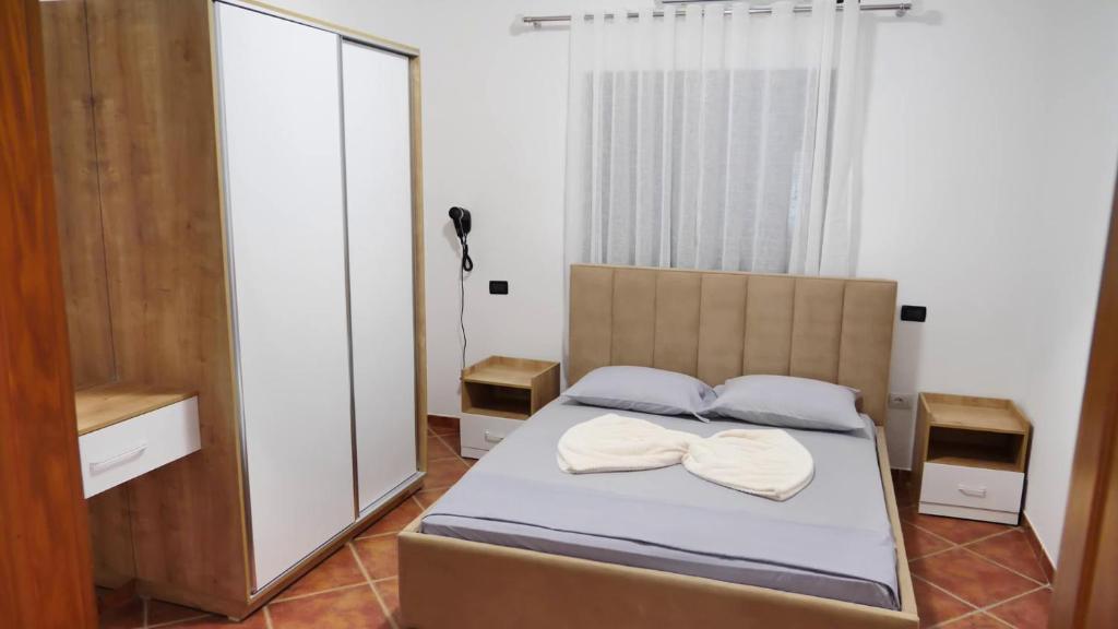Postel nebo postele na pokoji v ubytování Hotel Laura