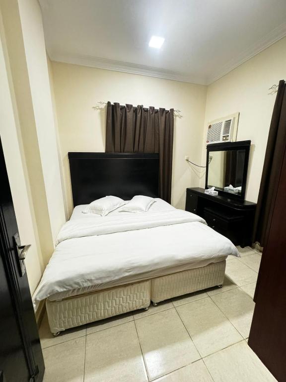 Postel nebo postele na pokoji v ubytování Concord Beach House