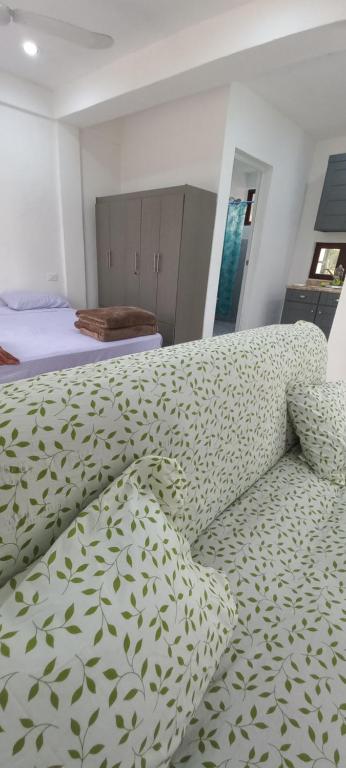 Postel nebo postele na pokoji v ubytování Estudio Flamboyan