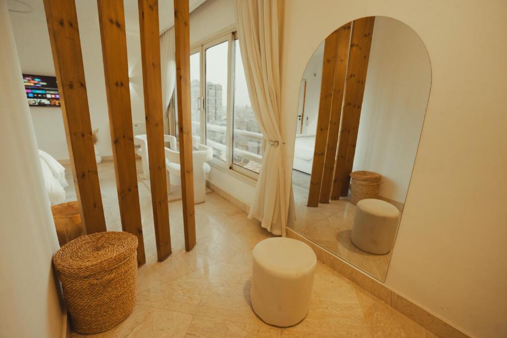 TV a/nebo společenská místnost v ubytování Nile Zamalek - Luxurious Retreat
