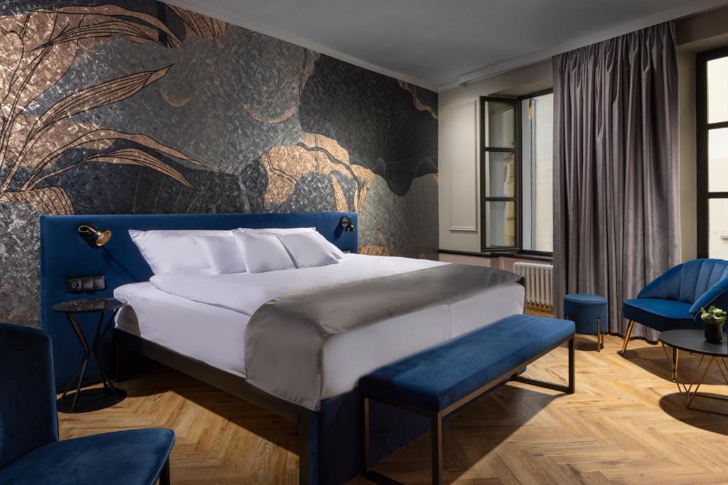 Postel nebo postele na pokoji v ubytování Hotel Savorsky