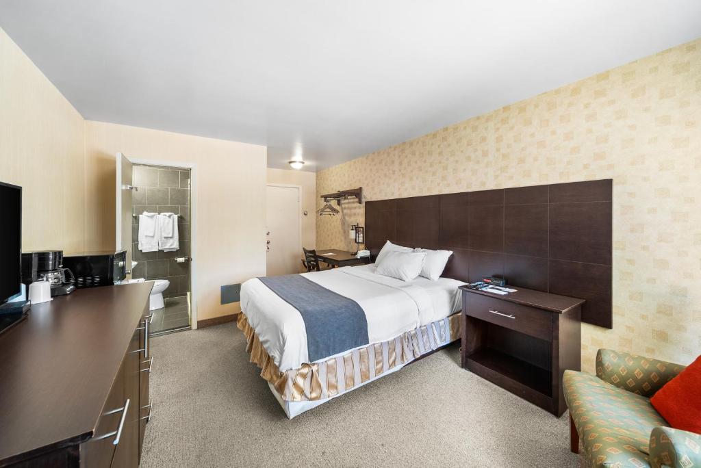 Postel nebo postele na pokoji v ubytování Hotel-Motel Coconut