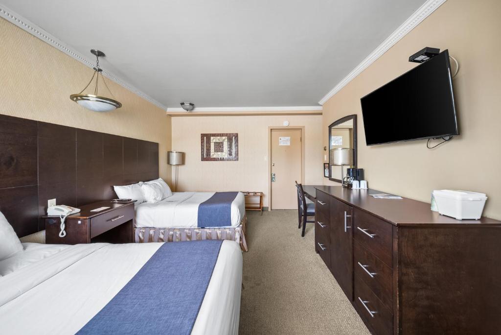 TV a/nebo společenská místnost v ubytování Hotel-Motel Coconut
