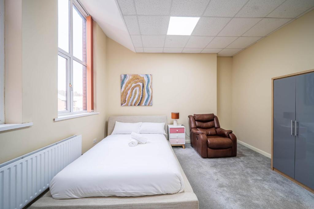 Postel nebo postele na pokoji v ubytování Bessemer Rooms