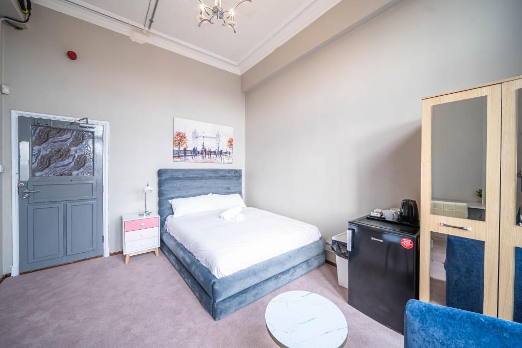 Postel nebo postele na pokoji v ubytování Bessemer Rooms