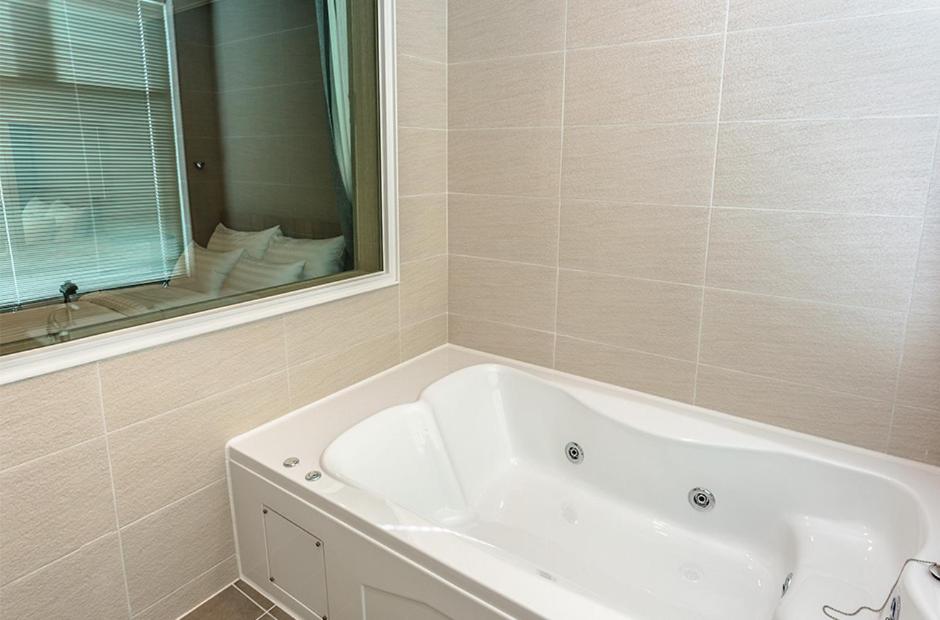 Koupelna v ubytování Rich Hotel