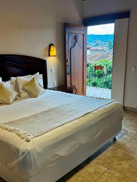 Postel nebo postele na pokoji v ubytování Parador Margarita