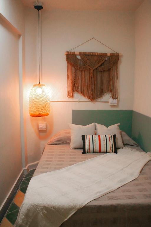 Postel nebo postele na pokoji v ubytování Mascomunal hostel