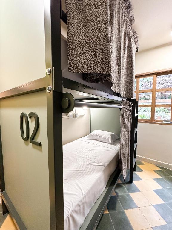 Postel nebo postele na pokoji v ubytování Mascomunal hostel