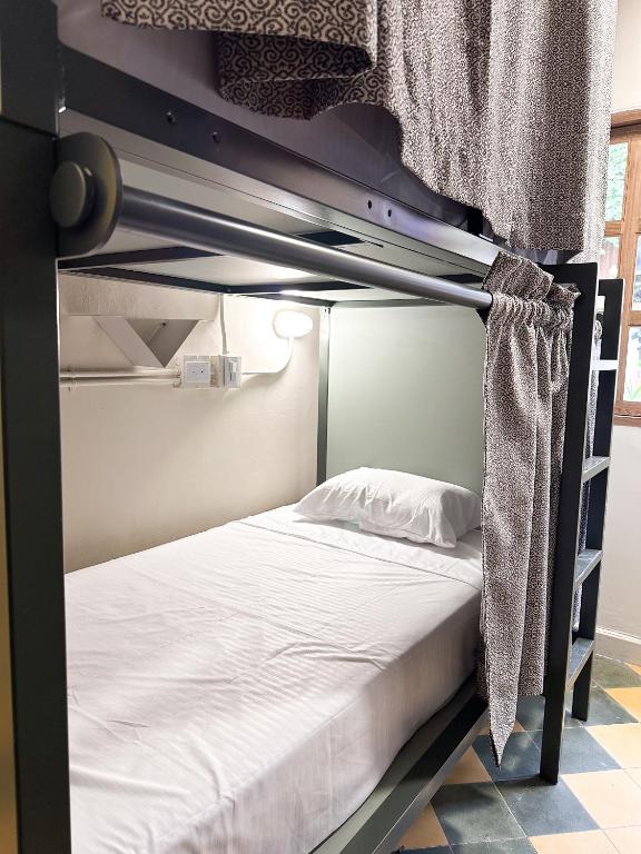 Postel nebo postele na pokoji v ubytování Mascomunal hostel