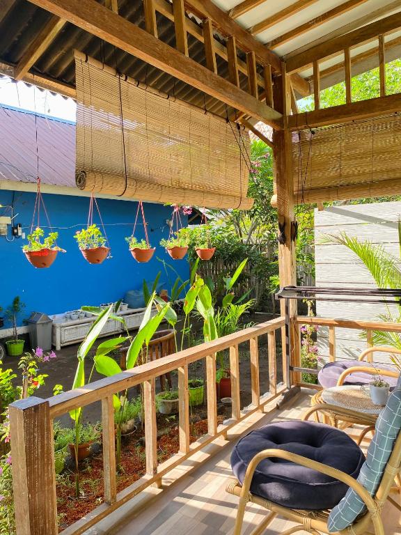 Un balcón o terraza en Marta House gili air
