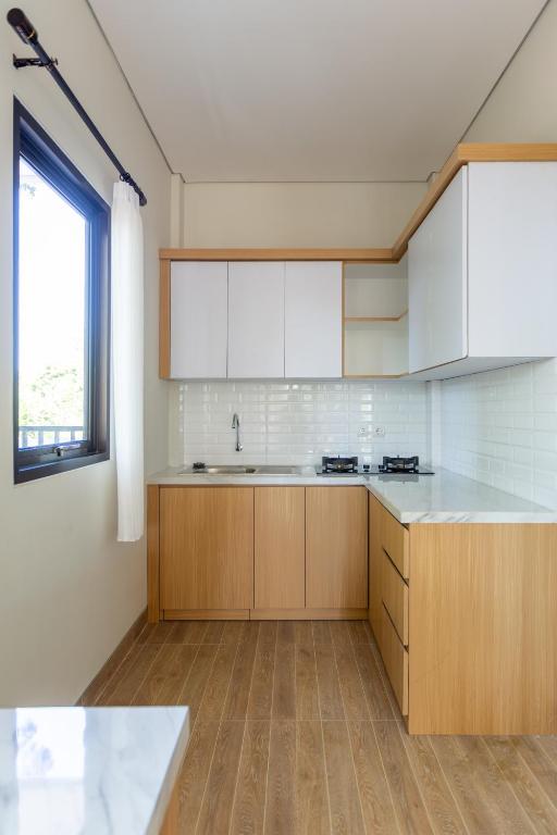 Kuchyň nebo kuchyňský kout v ubytování Fazza Homes