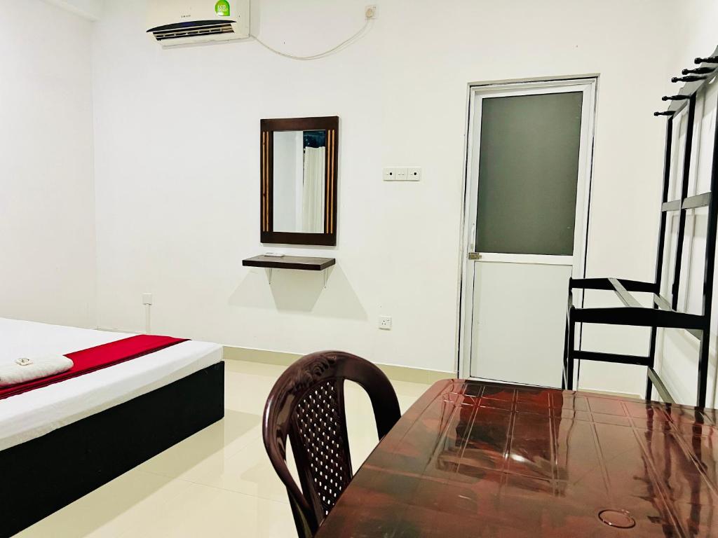 Postel nebo postele na pokoji v ubytování Eco Resort Kandy
