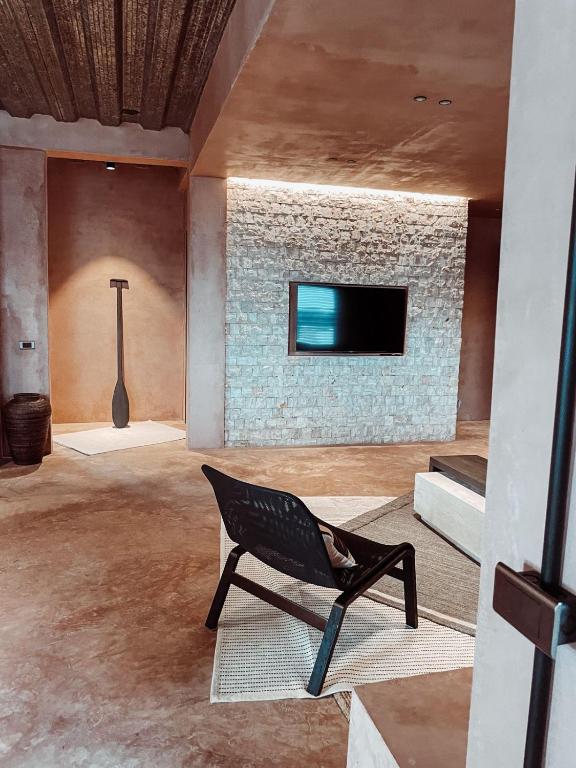 TV a/nebo společenská místnost v ubytování The Rover Siargao - Loft