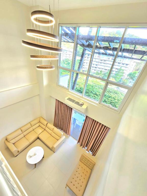 Posezení v ubytování The Loft Pico de Loro