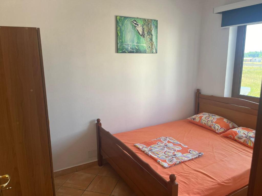 Postel nebo postele na pokoji v ubytování Residence Domus Aurea