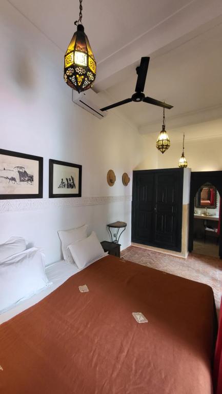 Postel nebo postele na pokoji v ubytování Riad Aloes & Spa