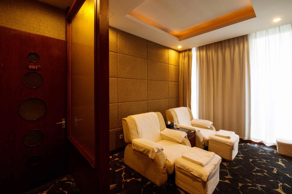 Posezení v ubytování Shanghai Yuehua Hotel