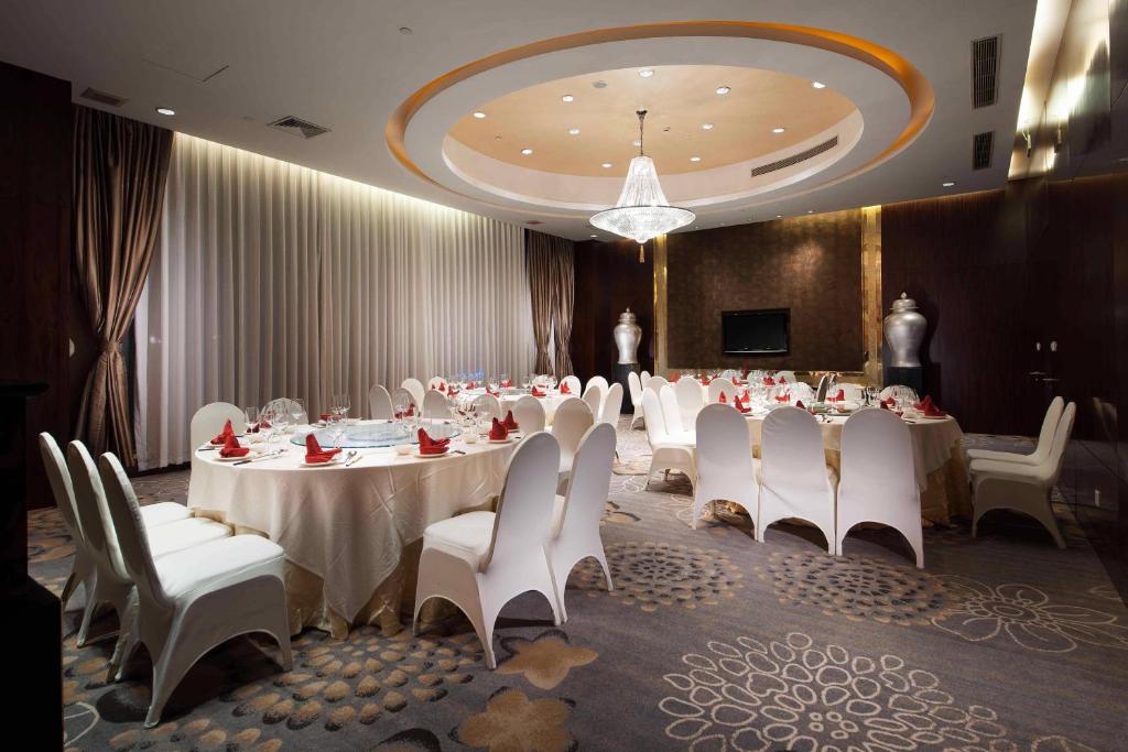 Restaurace v ubytování Shanghai Yuehua Hotel