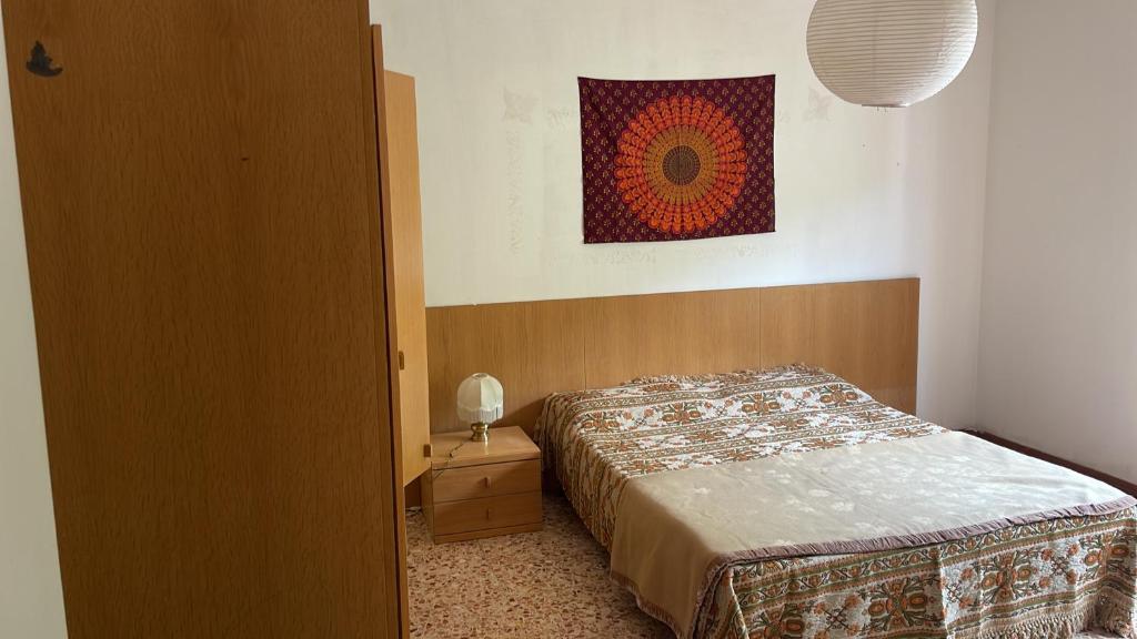 Postel nebo postele na pokoji v ubytování Laghi di Como appartamento di Licinia e Mario