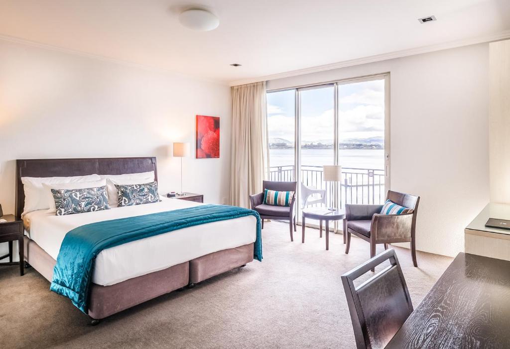 Postel nebo postele na pokoji v ubytování Trinity Wharf Tauranga
