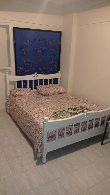 Postel nebo postele na pokoji v ubytování Cosy apartment in AlNakheel beach Alexandria kilo 21 شقه رائعه بشاطىء النخيل الكيلو