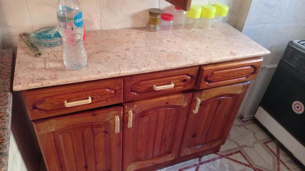 Kuchyň nebo kuchyňský kout v ubytování Cosy apartment in AlNakheel beach Alexandria kilo 21 شقه رائعه بشاطىء النخيل الكيلو