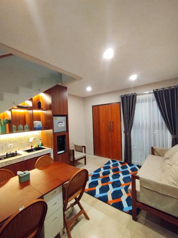 Ένα ή περισσότερα κρεβάτια σε δωμάτιο στο Villa Nuansa Alibaba Village