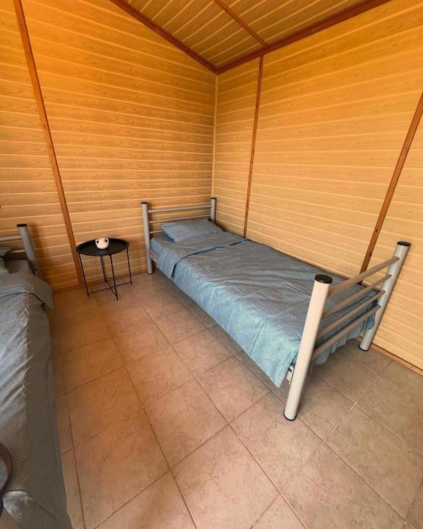 Postel nebo postele na pokoji v ubytování Oaza de Corbu