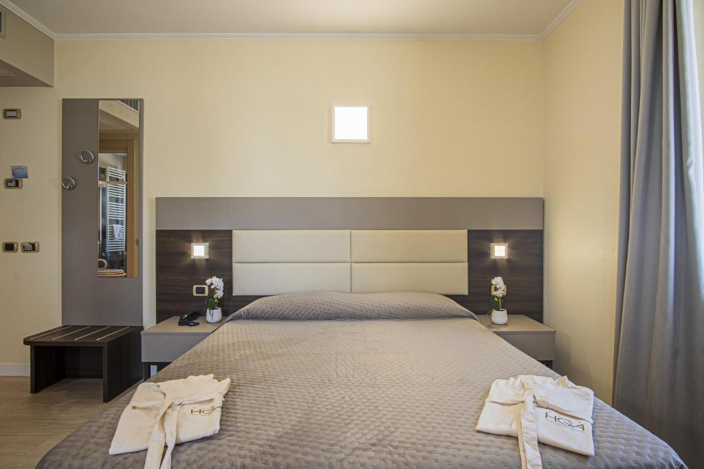 Кровать или кровати в номере Grande Albergo