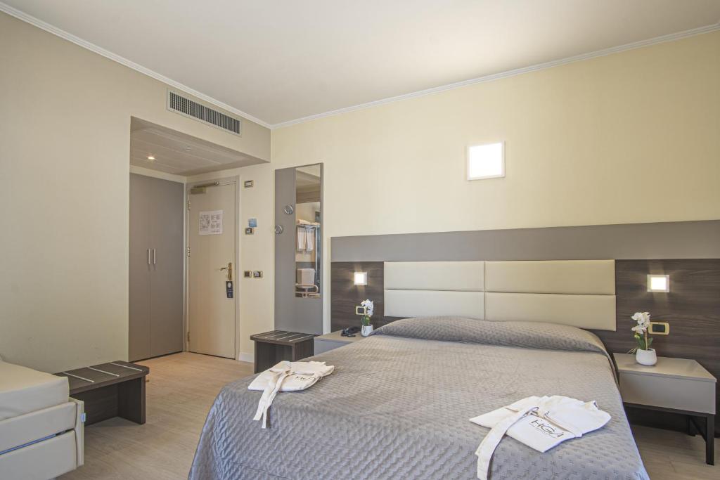 Кровать или кровати в номере Grande Albergo