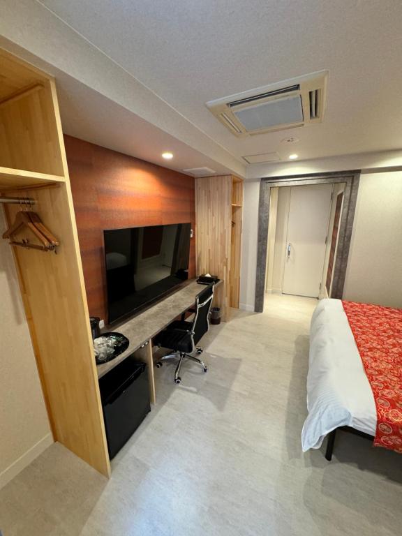 TV a/nebo společenská místnost v ubytování Hotel Be-zen shimanouchi