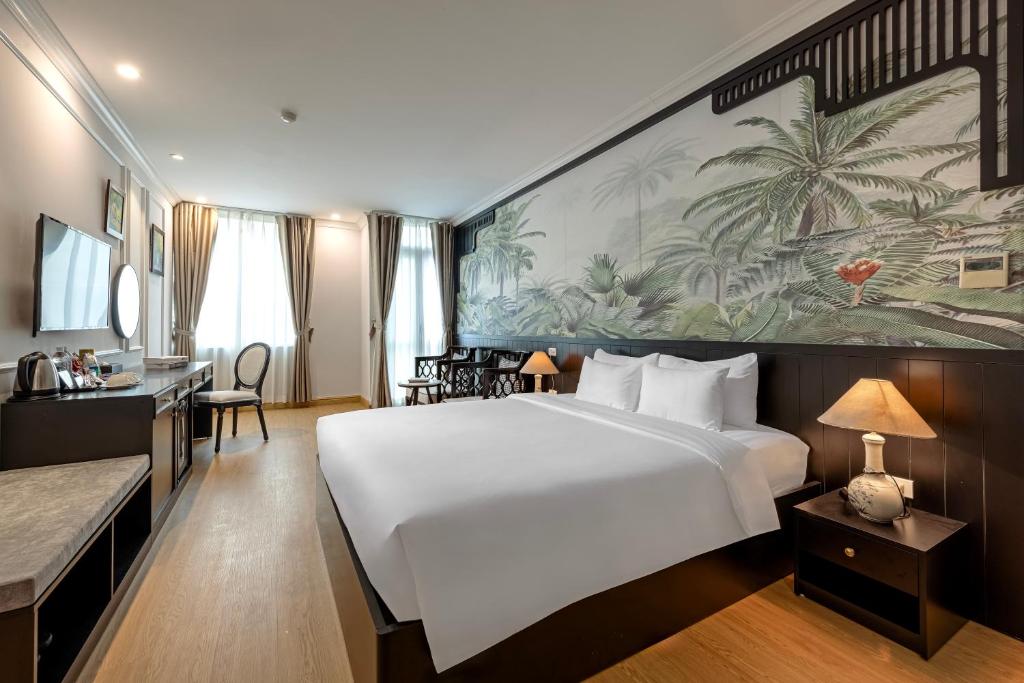 Postel nebo postele na pokoji v ubytování San Premium Hotel