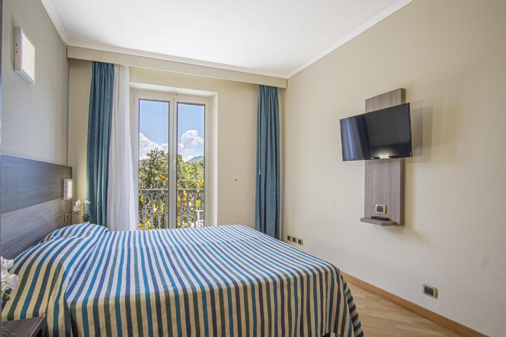 Телевизор и/или развлекательный центр в Grande Albergo
