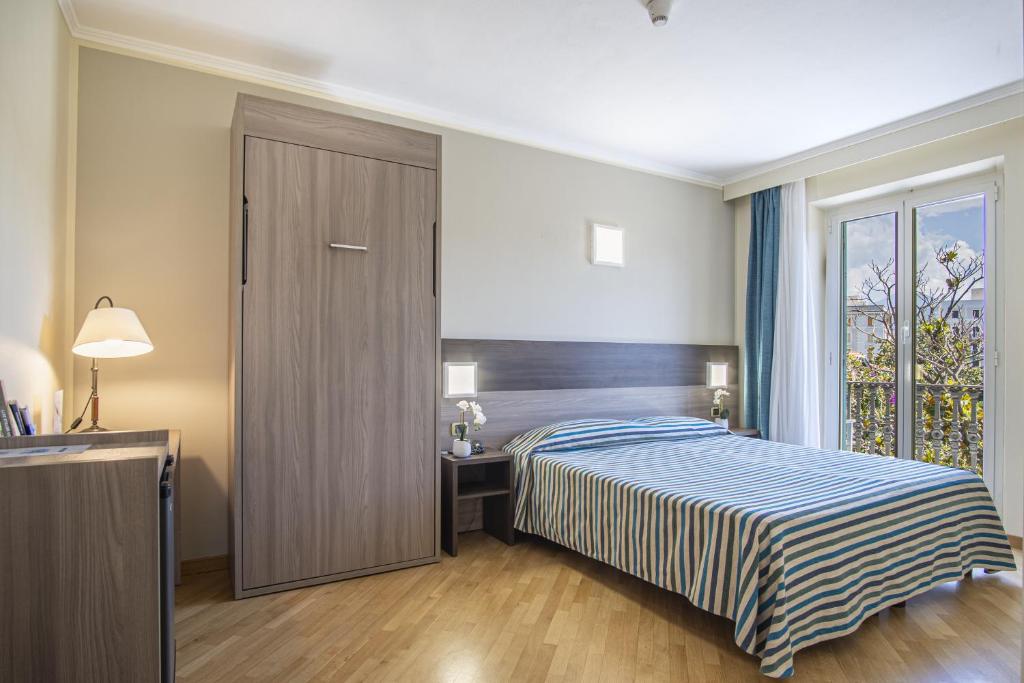 Кровать или кровати в номере Grande Albergo