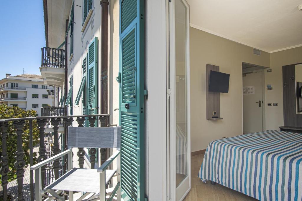 Кровать или кровати в номере Grande Albergo