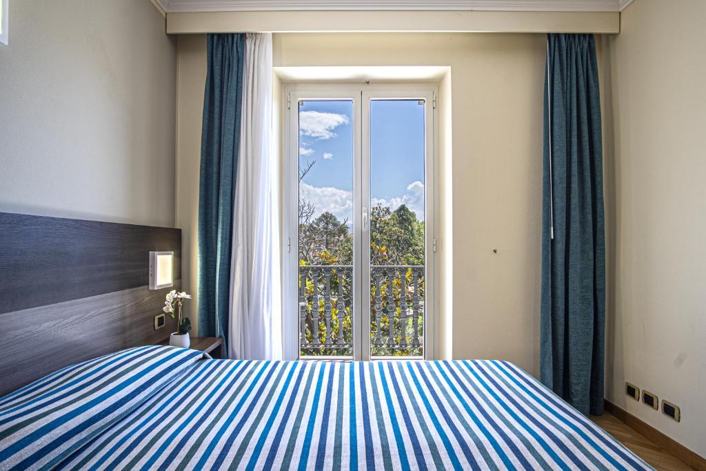 Кровать или кровати в номере Grande Albergo
