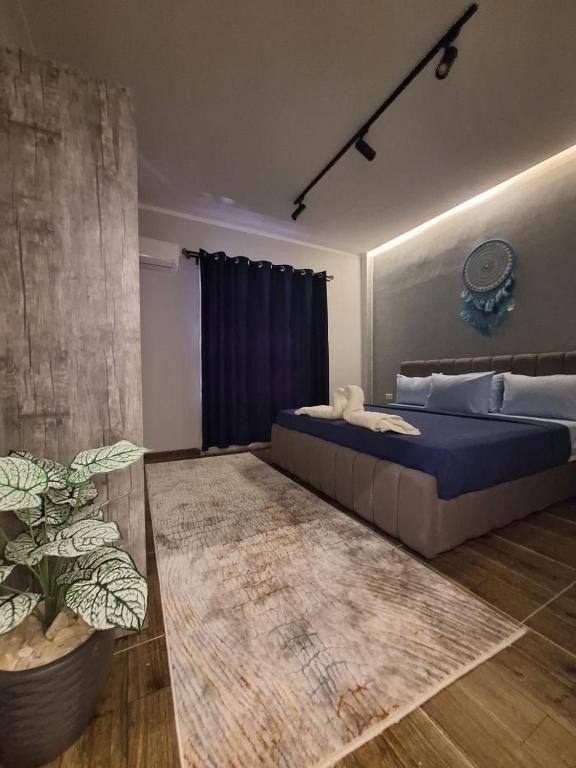 Postel nebo postele na pokoji v ubytování downtown Family Suites