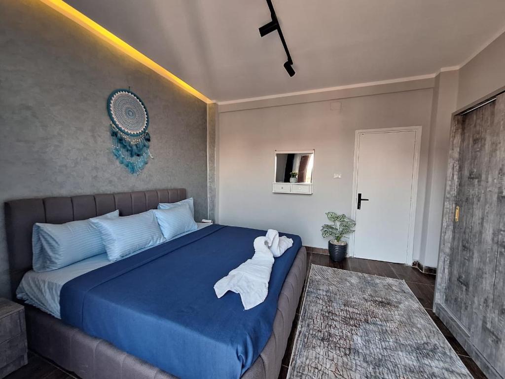 Postel nebo postele na pokoji v ubytování downtown Family Suites